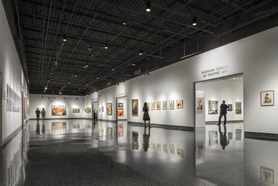 A small group of people gather in a gallery at the Museum of Arts and Sciences in Daytona Beach.