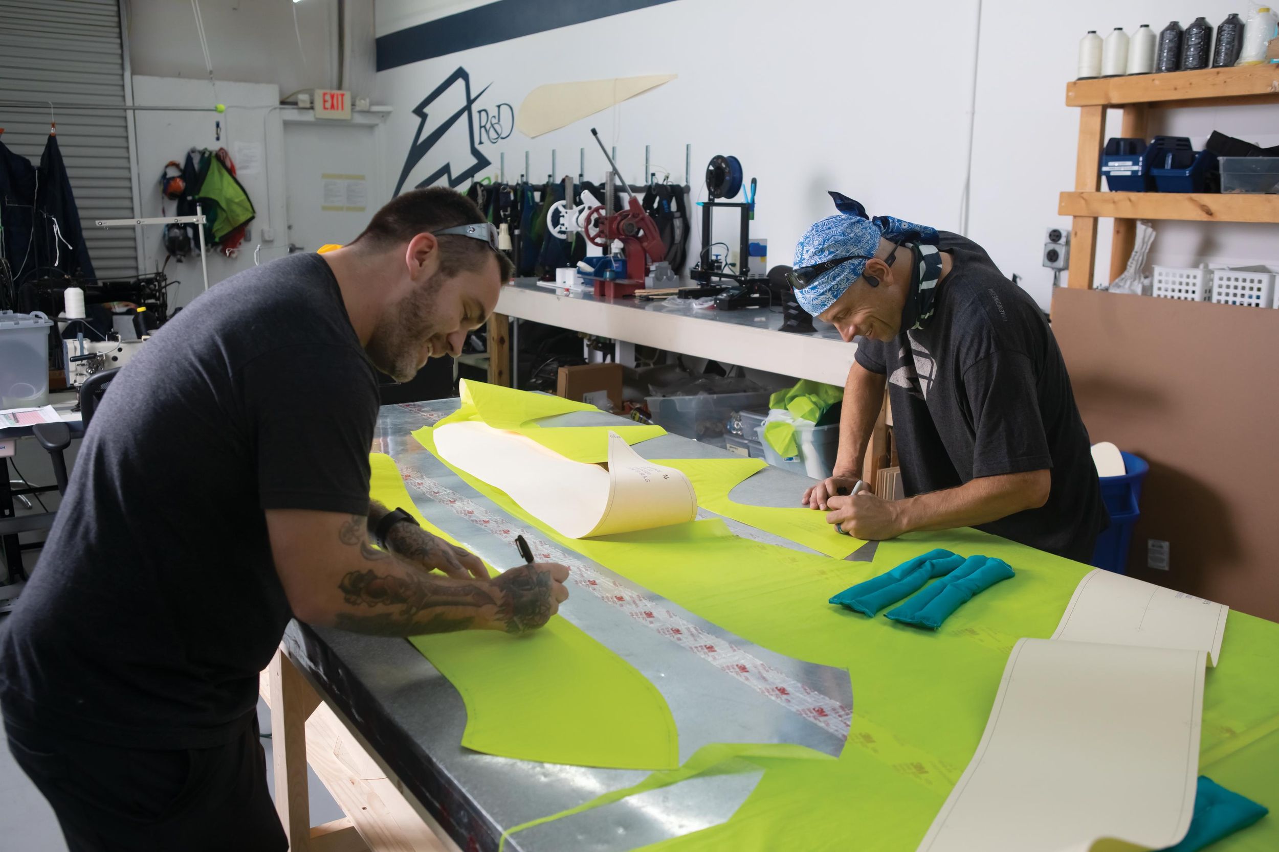 Two men sketching at Aerodyne Research.